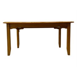 Laura Ashley - contemporary pine dining table, rectangular top with moulded edge, raised on square supports with chamfered lower sections