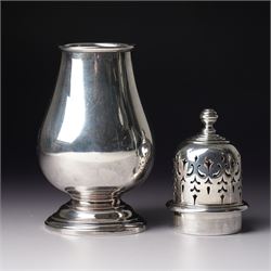 Georg Jensen sterling silver spirit measure of Art Deco design with flattened handle and a silver sugar caster Birmingham 1959