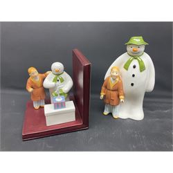 Coalport Characters The Snowman, comprising three snowglobes, Advent calendar, bookend and money box  