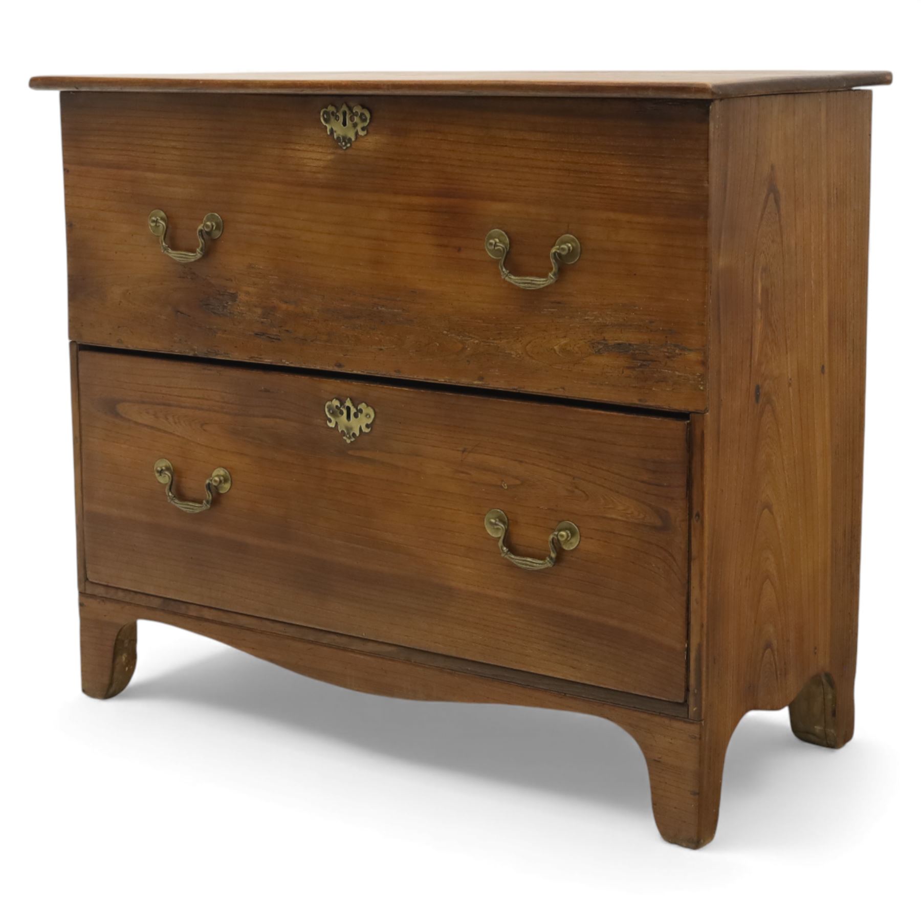 18th century style oak mule chest, the hinged rectangular top opening to a plain interior, above a lower section fitted with two long drawers with brass swan neck handles and shaped escutcheons, upon shaped bracket feet