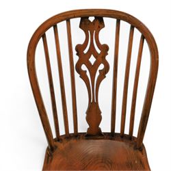 Set of six elm Windsor chairs, saddle seats with crinoline stretchers