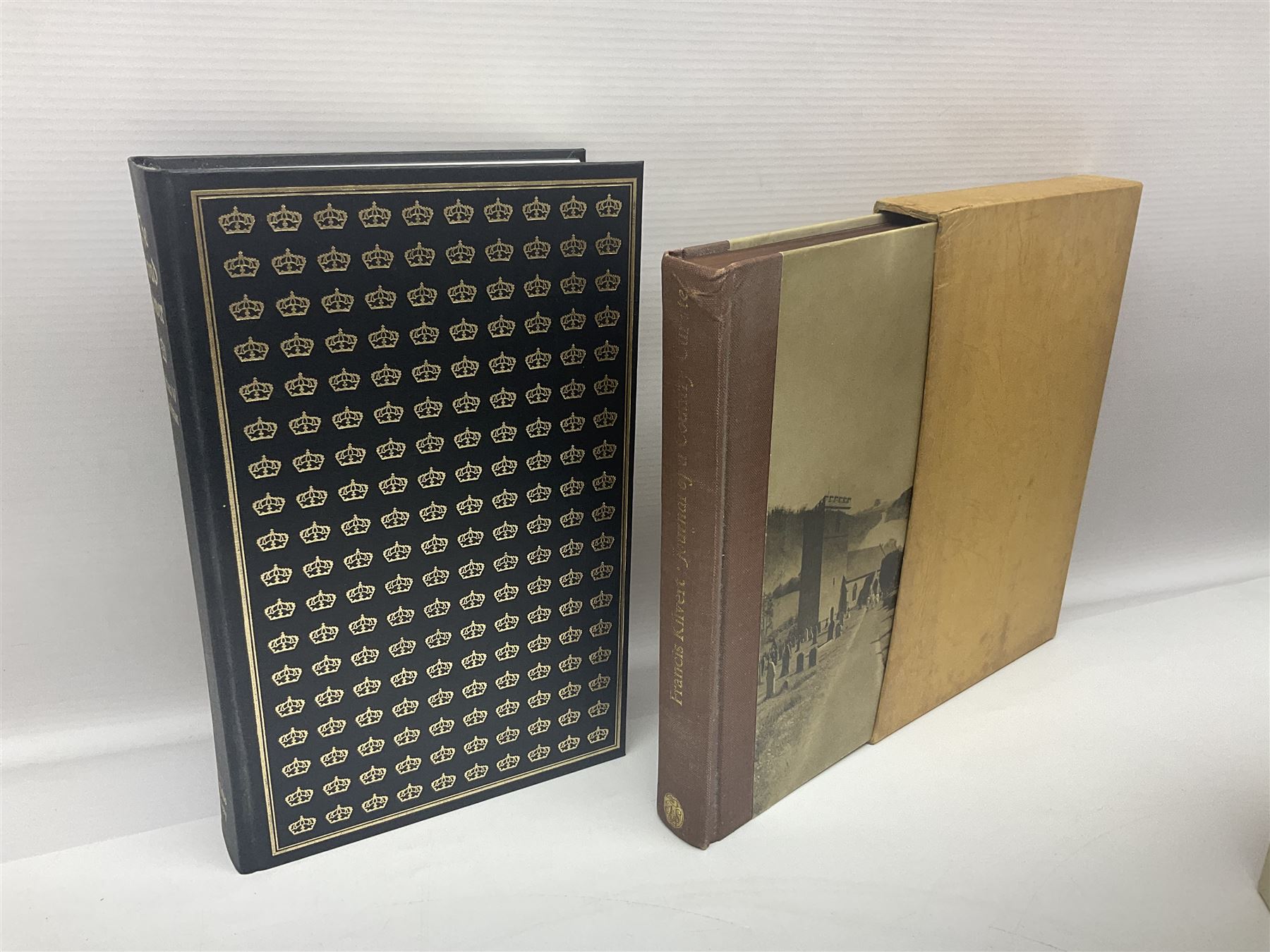 Seven Folio Society books, including The Divine Comedy, Charles Dickens Christmas Book, The Proud Tower, etc, all with outer sleeves