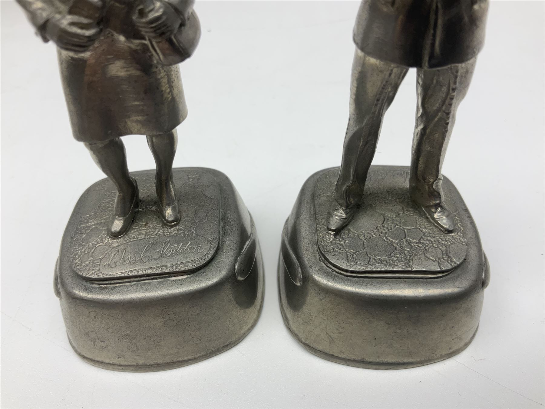 Police - Victorian turned hardwood truncheon with traces of decoration and VR cypher L42cm; Humberside Police helmet with Queens Crown helmet plate; hand lamp inscribed 'The Inspector'; and small pair of pewter figures of police officers (5)