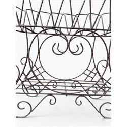Mid-20th century wirework garden planter, oval form with heart shaped centre, under-tier shelf above scrolling feet