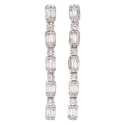 Pair of 18ct white gold baguette and round brilliant cut diamond pendant earrings, stamped K18, diamond total weight 1.60 carat 