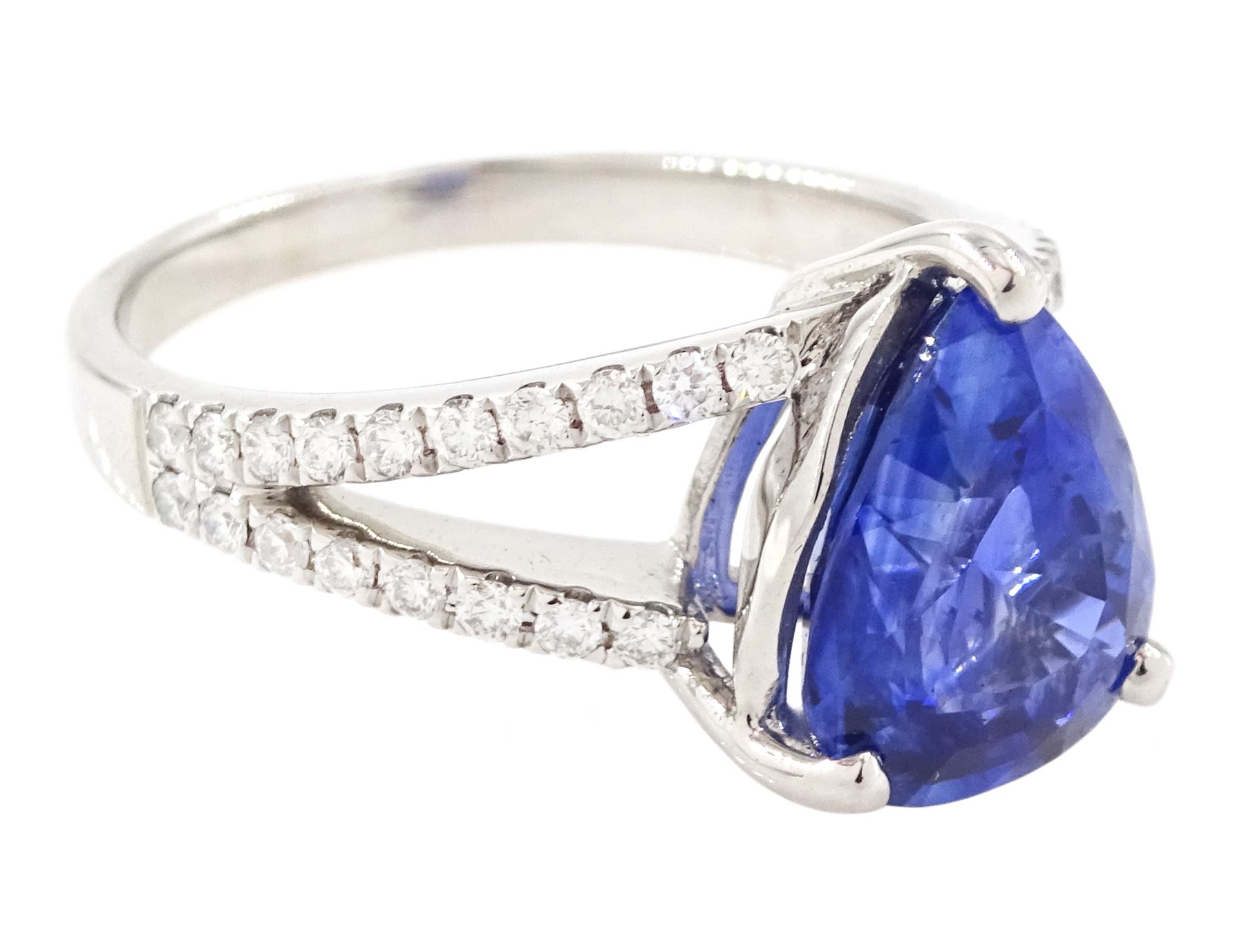 18ct white gold Ceylon sapphire and diamond ring, single pear cut sapphire of approx 2.50 carat, with split round brilliant cut diamond shoulders, stamped 750, total diamond weight 0.33 carat