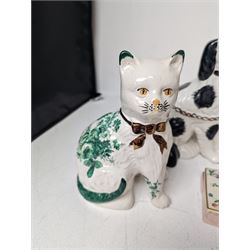 Pair of Staffordshire style dogs, together with a pair of Staffordshire style cats and a Clarice Cliff for Royal Staffordshire floral trinket box