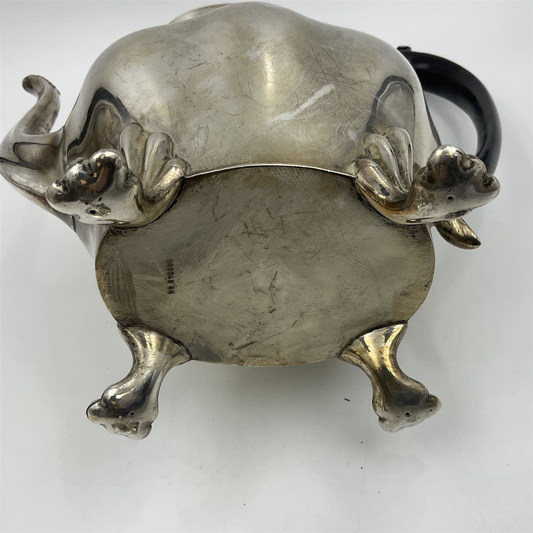 Five piece Edwardian silver tea service, comprising teapot and coffee pot, each with ebonised scroll handle, tea caddy with hinged cover, twin handled open sucrier, and milk jug, each of rounded bombe form, upon four paw feet, hallmarked William Adams Ltd, Birmingham 1904 and 1905, coffee pot H26cm
