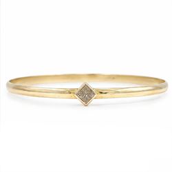 18ct gold fancy champagne / brown diamond bangle, bezel set with a single princess cut dia...