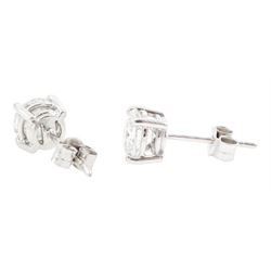 Pair of 18ct white gold round brilliant cut diamond stud earrings, hallmarked, total diamond weight approx 2.05 carat