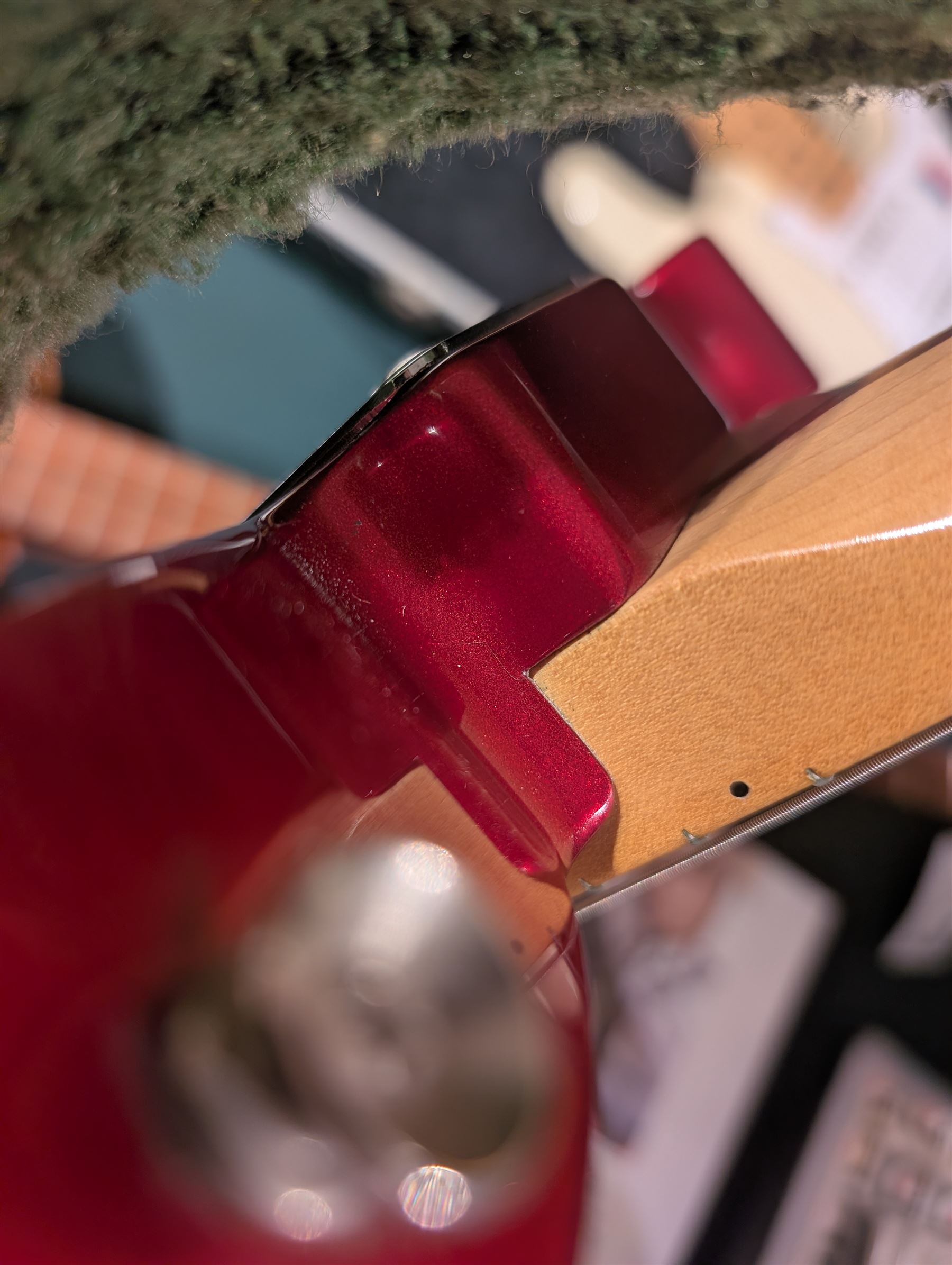 Fender Telecaster electric guitar, serial no. T021384 made in Japan c.1994, with Candy Apple Red body, white scratch plate and maple neck, guitar L98cm