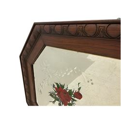 Early 20th century oak mirror, in canted frame with black and gilt paint finish (90cm x 64cm), and a similar mirror