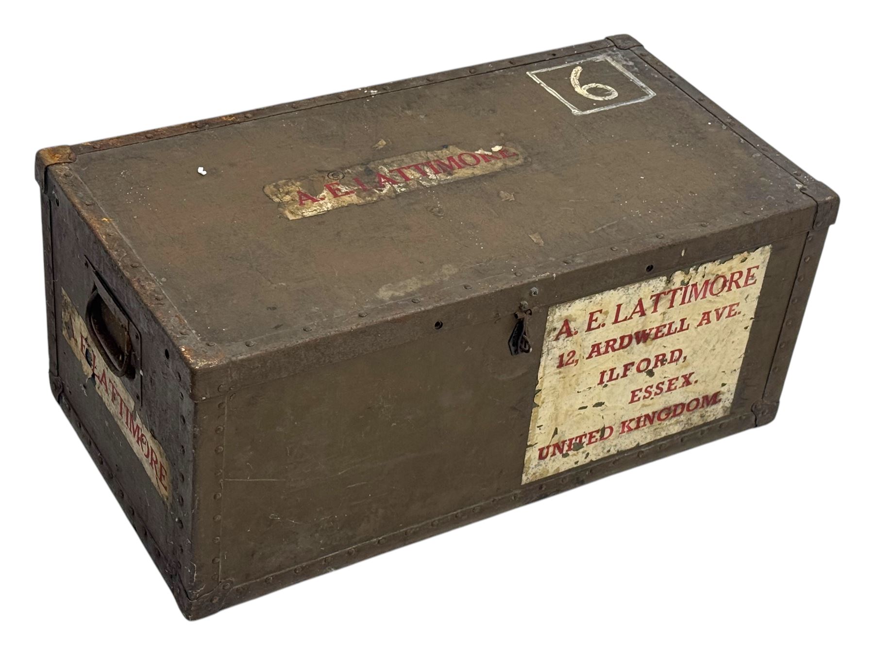 Vintage metal bound steamer trunk, exterior labels reading 