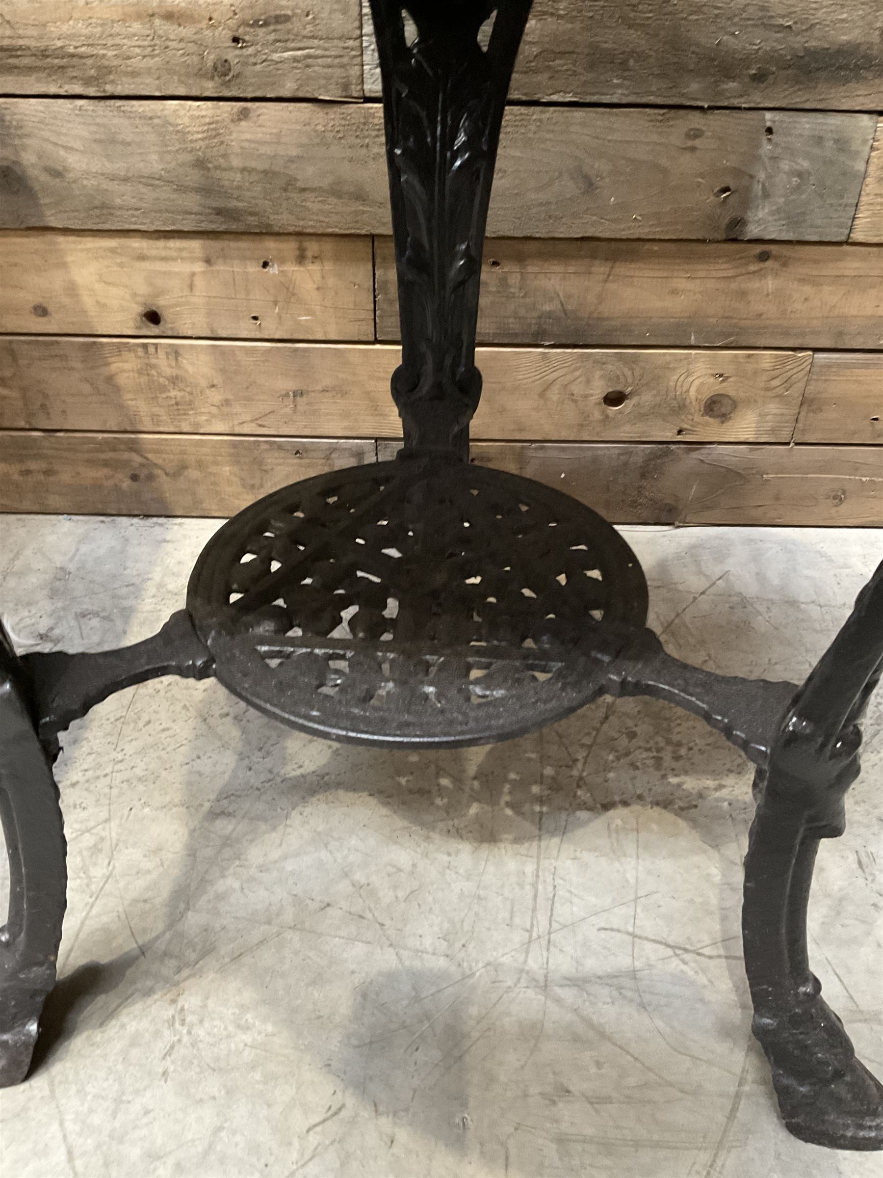 19th century cast iron Coalbrookdale design table with circular top (D66cm, H74cm) and a cast iron pedestal table with square top (W69cm, D70cm, H72cm)