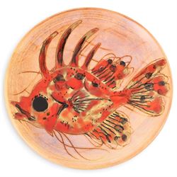Monique Brunner - earthenware plates, decorated with fish and shellfish, upon a pink and cream ground, signed Vallauris beneath, six D20cm, one D24cm  