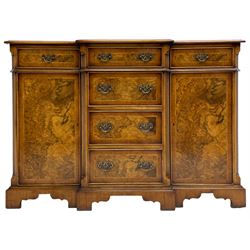 Georgian design figured walnut sideboard, moulded break-front crossbanded top over six drawers and two cupboards, highly figured door fronts, canted and fluted upright corners, on bracket feet