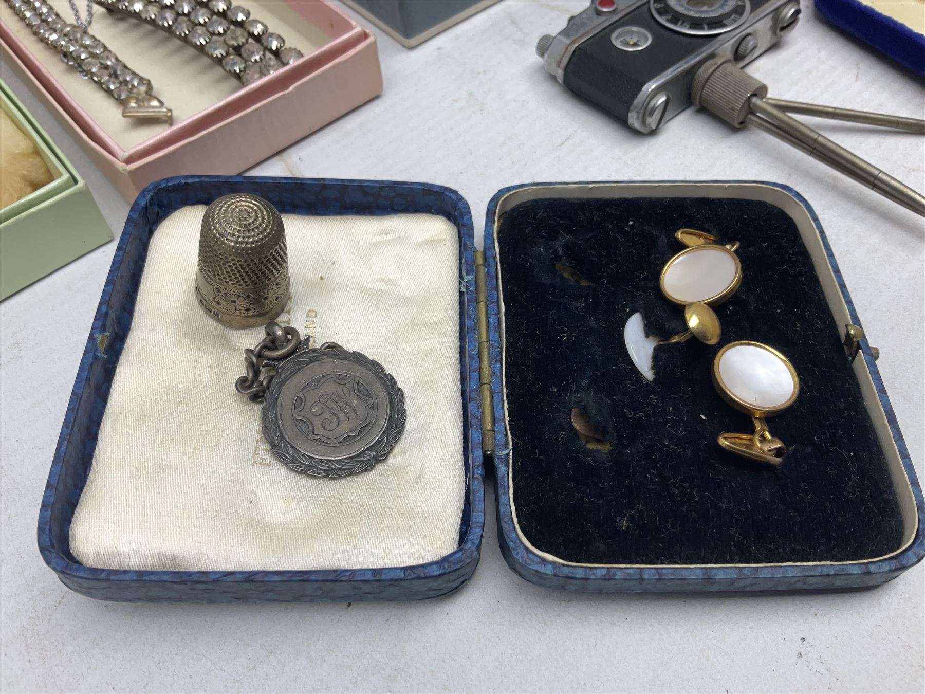 Victorian and later jewellery including silver thimble, rolled gold pendants, earrings and brooches and a collection of wristwatches including Sekonda, The Westminster Collection Historic Timepieces Spitfire pocket watch etc