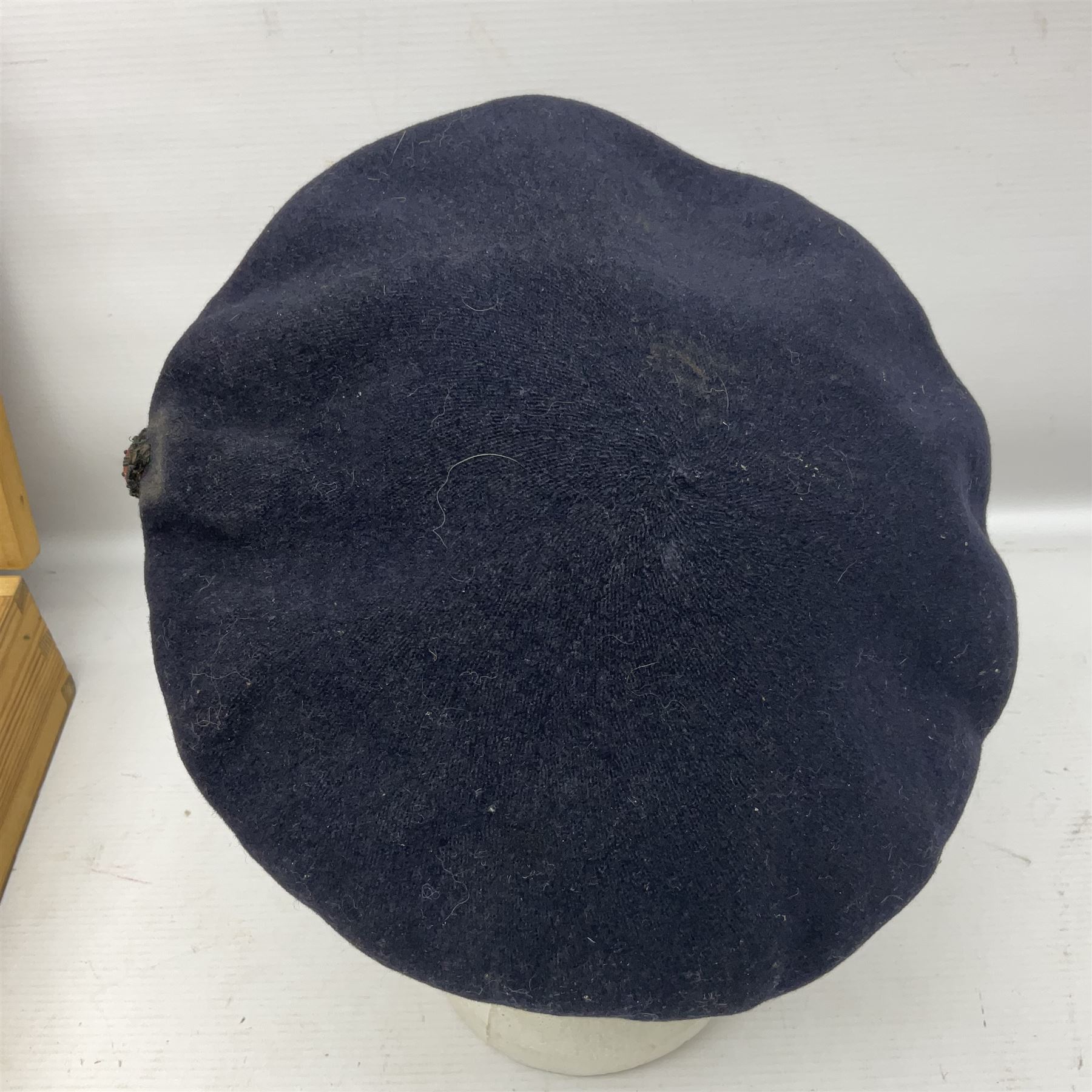 Collection of nineteen British Army booklets 1940s - 1970s including Small Arms Training 1944, various Infantry Training, Cadet Training Manual 1978, Signal Training, Commander's Aide Memoires etc; 1950s blue beret with Yorks Brigade badge; part travelling toilet set in cloth roll; all contained in pine box with webbing straps