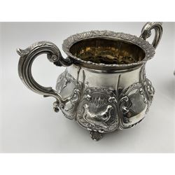 Victorian silver three piece tea service, comprising teapot, twin handled open sucrier, and milk jug, each of bellied form with acanthus capped scroll handles, the sides embossed with alternating scroll edged vacant panels and panels containing a pair of birds, upon four palmette feet, the teapot with ivory insulators to handle, and bird finial to the hinged domed cover, hallmarked William Hunter & Son, London 1861, teapot H19cm, including handles sucrier H13.5cm, including handle milk jug H12cm

This item has been registered for sale under Section 10 of the APHA Ivory Act