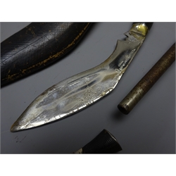  19th century continental hunting sword with 62cm single edged steel blade, brass hilt with bird's head quillons and pommel and bound grip 75cm overall, a 19th century naval officer's dirk with 48cm fullered steel blade, brass hilt with lion's head pommel and horn grip 61cm overall, a small Indian kukri knife and a relic 19th century ten-shot revolver (4)  