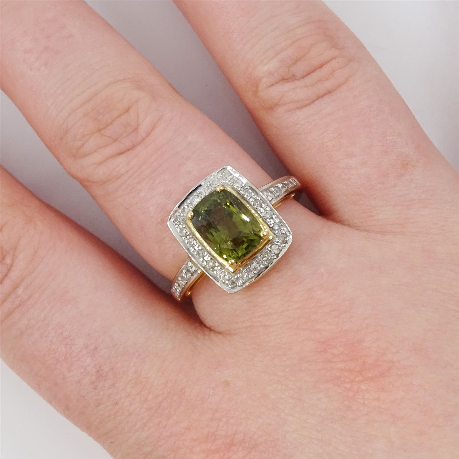 18ct gold alexandrite and diamond cluster ring by Lorique, single cushion cut alexandrite of 2.70 carat, with round cut diamond surrounded, Birmingham 2013, boxed with certificate
