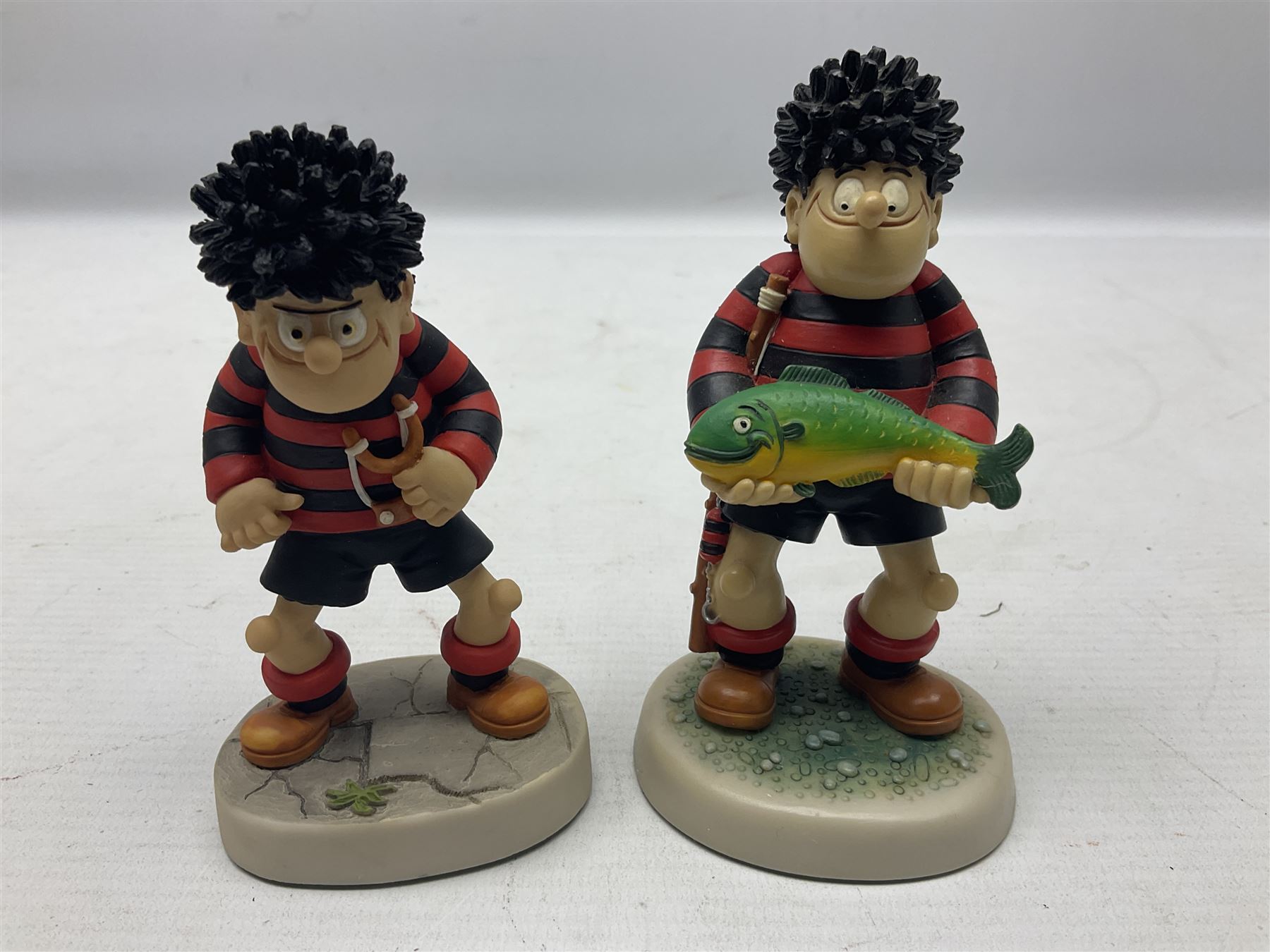 Thirteen Robert Harrop figures from the Beano Dandy collection, comprising Yo-Yo Collectors Piece 1996, Desperate Dan BD03, Cuthbert Cringeworthy BD08, Teach BD06, 'Erbert BD14, Toots BD12, Winston BD17, Fatty BD07, Dennis The Menace BD01, Dennis the Menace Fishing BD806, Sydney BD13, Wilfrid BD15 and Plug BD11
