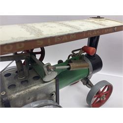 Mamod TE1a steam traction engine with burner, bunker, steering rod and funnel; red and black painted Tri-ang tin-plate Jones KL44 mobile crane; and two Hull Savings Bank Home Safe money boxes; all unboxed (4)