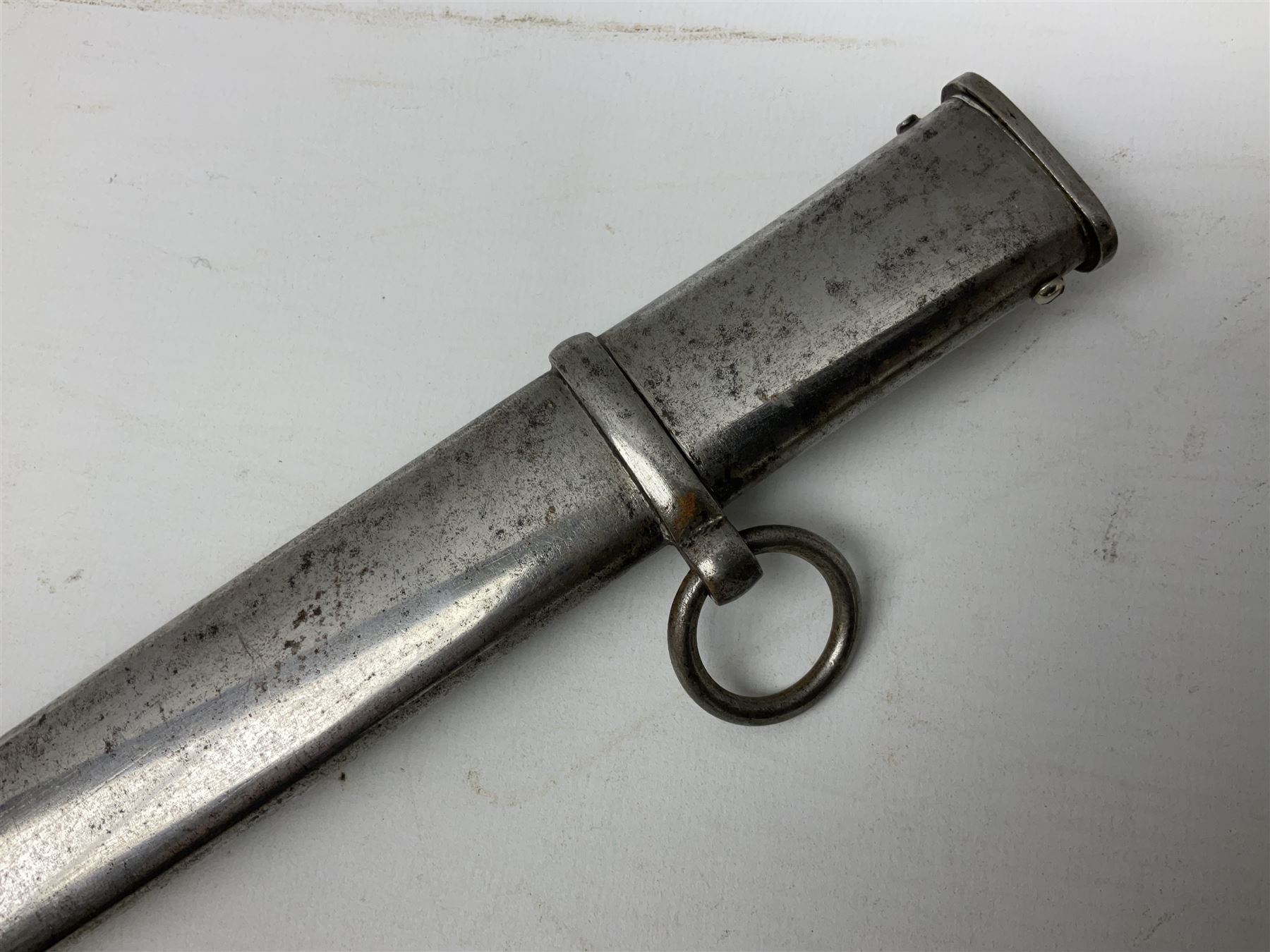 19th Century Prussian Infantry Officers 1889 pattern sword, the 77.5cm double fullered blade with makers mark to the ricasso for Weyersberg Kirschbaum & Co; curved brass top pommel with brass wire bound fish skin grip applied with crowned  Wilhelm II monogram; folding cross guard with Imperial eagle and double bar knucklebow; in polished steel scabbard with single suspension ring L94.5cm overall
