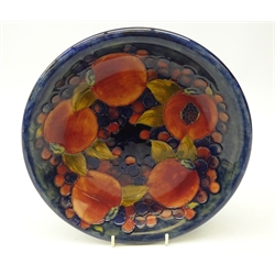  Mid 20th century Moorcroft Pomegranate pattern plate, impressed marks to base, D22cm   