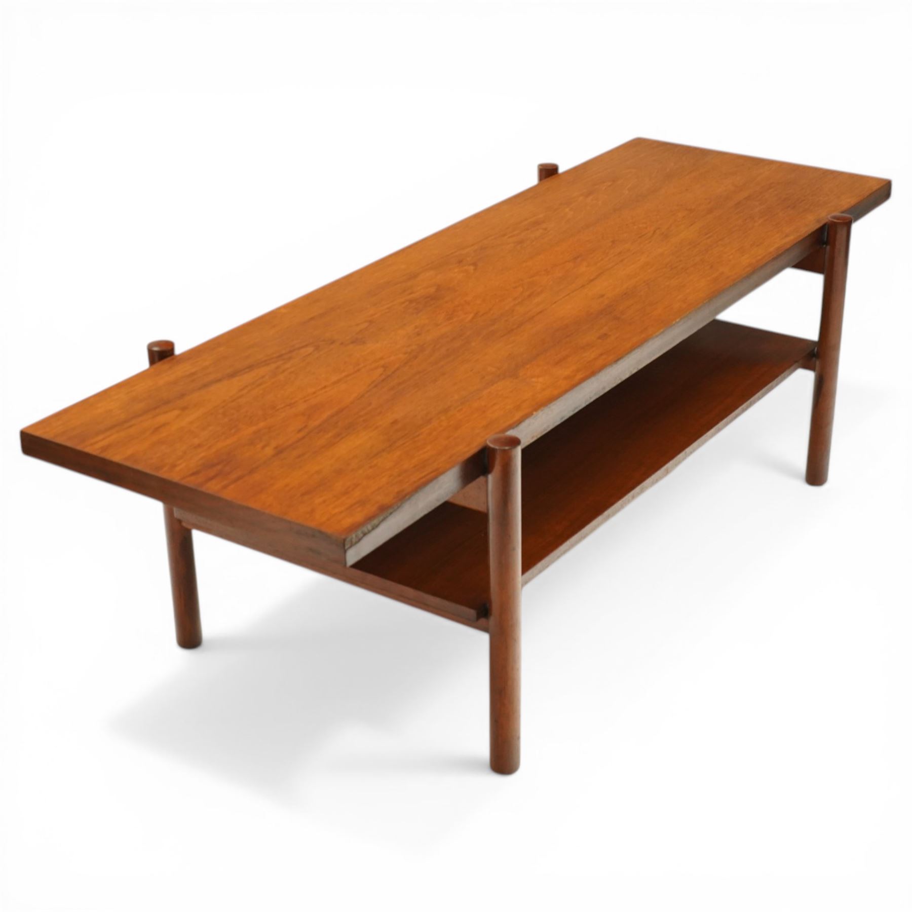 Mid-20th century Danish teak coffee table, rectangular top raised on cylindrical supports, united by under-tier 