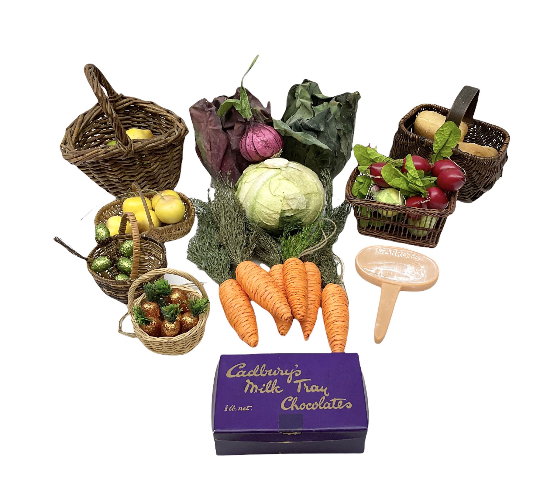 Vintage musical toys including three tin-plate drums by Chad Valley etc; two sets of cymbals; five miniature brass/copper bugles and horns; together with a quantity of vintage dolls artificial fruit and vegetables and basket ware; glass marbles etc