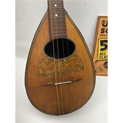 W.D. Keech banjolele pat.219720/23 with etched signature to the back; serial no.A12082 L55cm; and a restored Italian mandolin with segmented lute back; together with three music books