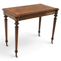 Victorian walnut card table, hinged rectangular moulded top with rounded corners and figured veneers, revealing a green baized lined interior, plain frieze with beaded lower edge, raised on ring turned tapering supports terminating in ceramic castors