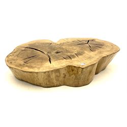Lacquered rustic root coffee table room feature