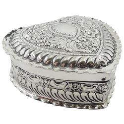 Victorian silver trinket box, in the form of a heart, the hinged cover and sides embossed with flower heads, C scrolls and fluting, opening to reveal a gilt interior, hallmarked Atkin Brothers, Sheffield 1893, W7cm, approximate weight 2.07 ozt (64.4 grams)