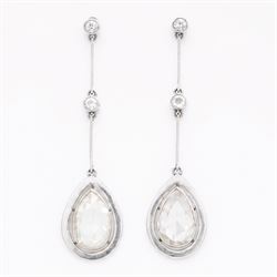 Platinum diamond modernist pendant stud earrings, set with a single rose pear cut diamond ...