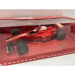 Four Paul's Model Art 1:18 scale Michael Schumacher Collection die-cast racing cars - Ferrari F310B; Ferrari F310/2; Benneton Renault B195; and Ferrari F300; all boxed (4)