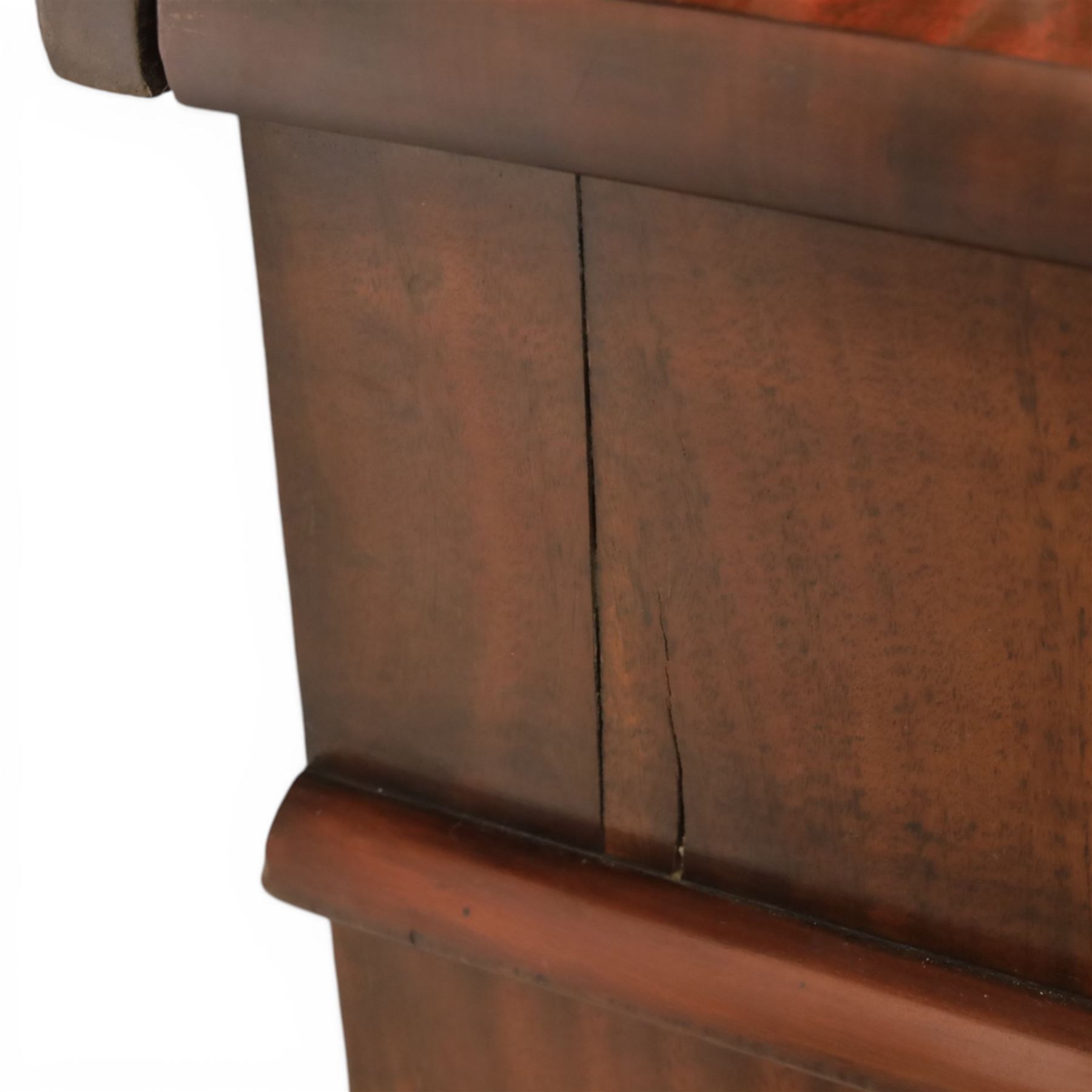 Mid Victorian mahogany pedestal sideboard, the rectangular top with raised back centred by a carved shell within scrolling acanthus and foliate cresting, over a central shaped frieze drawer flanked by two short drawers, above a kneehole recess, flanked by panelled cupboard doors with carved corbel supports, enclosing shelved interiors