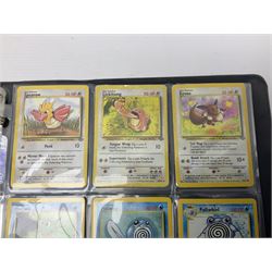 Collection of Pokemon trading cards, mostly 1999 Wizards Pokemon cards to include holo Charizard 4/102, first edition holo Machamp 8/102, further holographic cards; Dark Flareon 35/82 and Dark Vaporeon 45/82, cards from themed sets and 4th edition prints; 1998 Electronic Pokédex with cardboard boxes for themed decks Blackout, Overgrowth and Power Reserve Jungle, along with a large quantity of energy and trainer cards 
