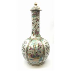 A 19th century Chinese Canton Famille Rose vase, of globular form with tall neck, and cover with finial, decorated with alternating panels of figural scenes, and birds and butterflies amongst blossoming and fruiting trees, with foliate surround against gilt, overall H57cm. 