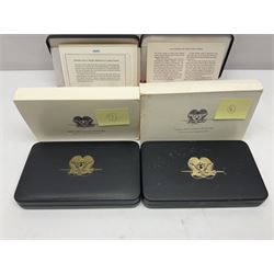 Four Papua New Guinea proof eight coin sets, from ten kina to one toea, comprising First Coinage of Papua New Guinea 1975 proof set, 1976, 1977, and 1979 proof sets, the 1977 and 1979 sets containing 925 silver ten kina and 500 silver five kina coins, all minted at the Franklin Mint, cased with certificates (4)
