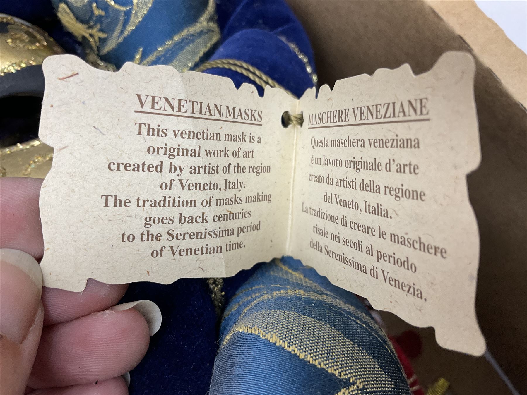 Large collection of decorative Venetian masks, to include two bearing tags for La Maschera Del Galeone, in two boxes 