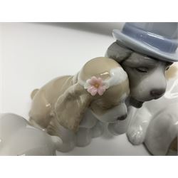 Ten Nao figures, to include three Cheeky Cherubs, Cat, Dog bride and groom etc