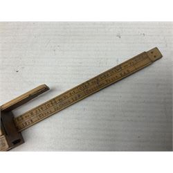 Late 18th/early 19th century boxwood ruler with four slides, for use by Customs &. Excise in the brewery trade; scales on all four sides each having a central slide with divisions on either side;  possibly made by 'E. Roberts, Dove Court, Old Jewry, London' (Edward Roberts (I) 1749-1776 & Edward Roberts (II) 1788-1795) L30.5cm