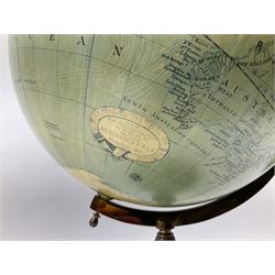 Terrestrial globe by Grinell, Washington, mounted on a brass half meridian and raised on turned wood pedestal base, H55cm