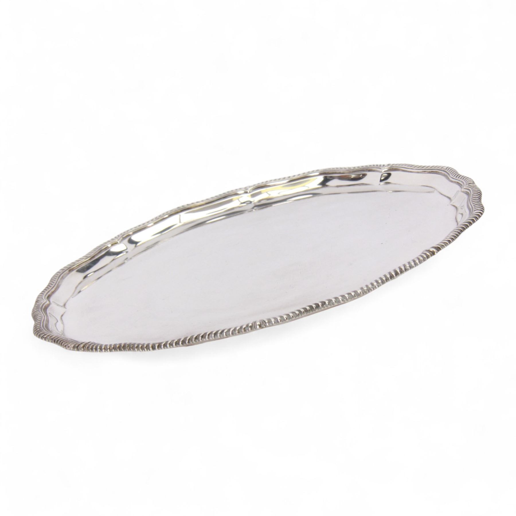 Early 20th century silver salver, of circular form with piecrust and oblique gadrooned rim, hallmarked Manoah Rhodes & Sons Ltd, Sheffield 1932, D36cm