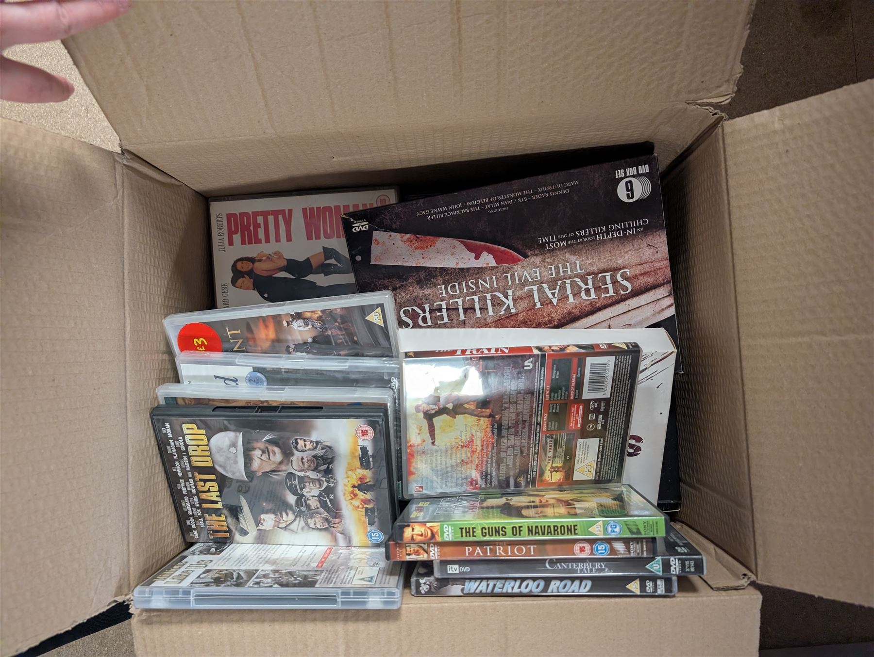 Two metal vehicle models, comprising tractor and car, sporran and kilt belt, Disney Star Wars slippers and a collection of dvds 