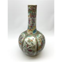 A 19th century Chinese Canton Famille Rose vase, of globular form with tall neck, and cover with finial, decorated with alternating panels of figural scenes, and birds and butterflies amongst blossoming and fruiting trees, with foliate surround against gilt, overall H57cm. 