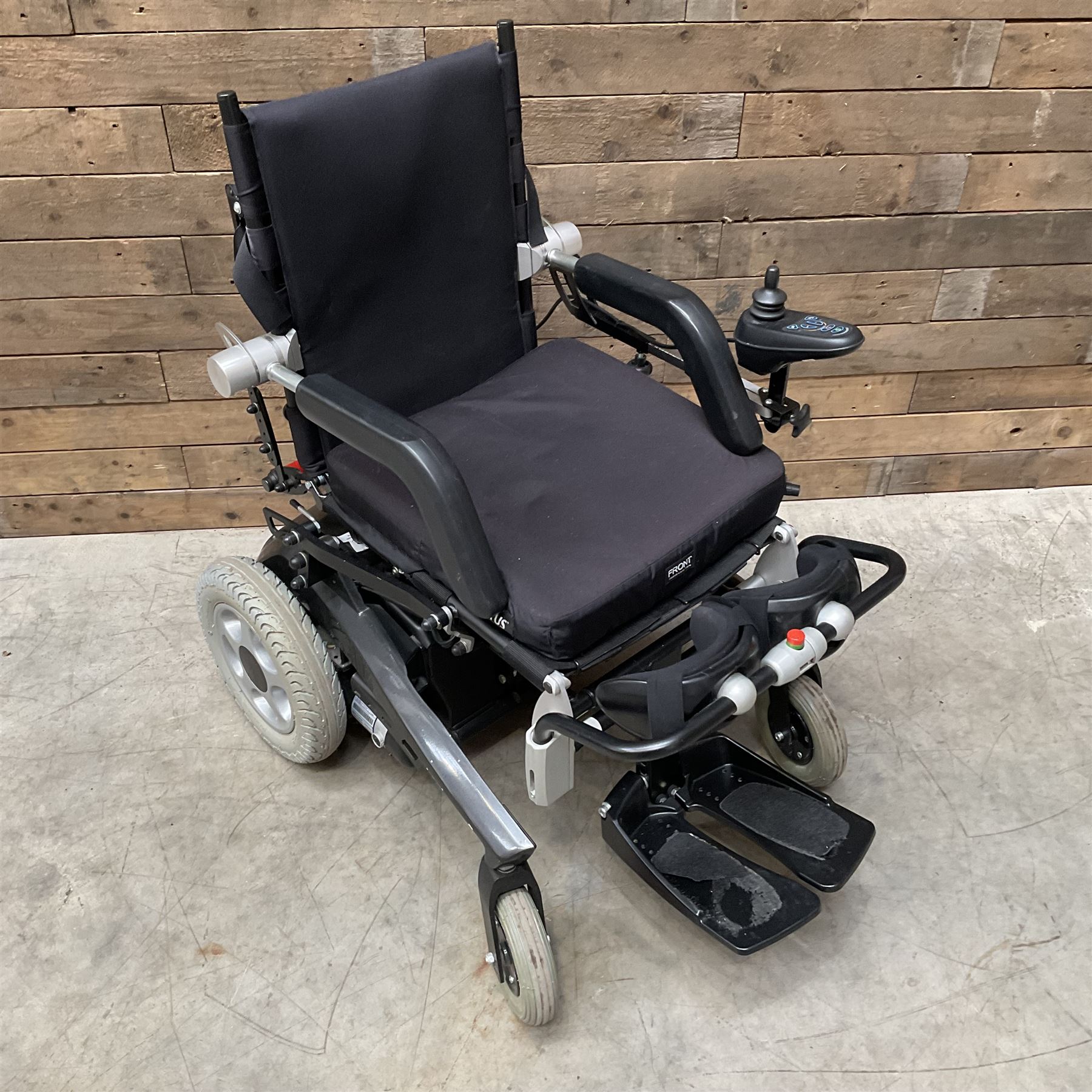 Permobil LSA Lifestand seated and standing wheelchair