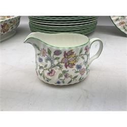 Minton Haddon Hall pattern tea and dinner wares, comprising two covered tureens, eighteen dinner plates, ten side plates, eighteen bowls, twenty dessert plates,  nineteen cups, twenty saucers, milk jug and two sucriers 